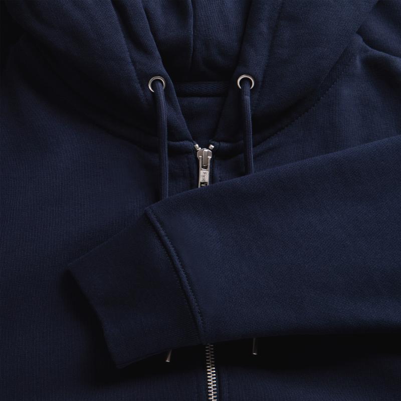 Snowman in Santa Claus look in winter